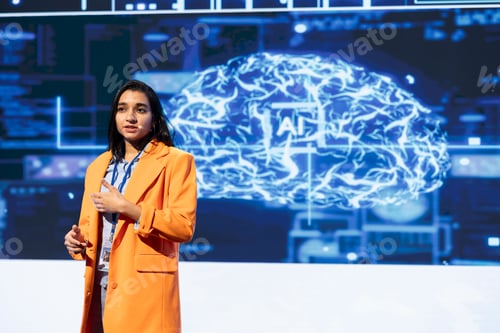 Preview: IT expert uses microphone to talk at AI convention with business investors