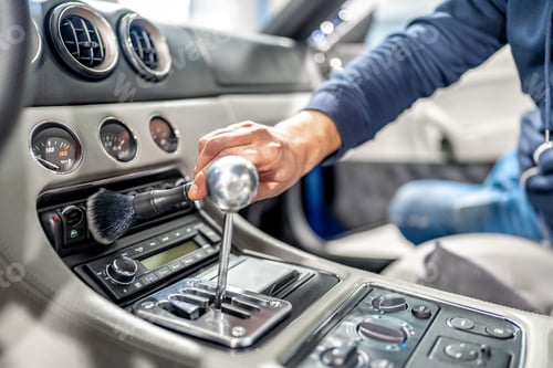 Preview: cleaning the interior of a luxury car with a brush