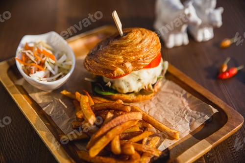 Preview: Delicious burgers with beef, tomato, cheese served with french fries and salad