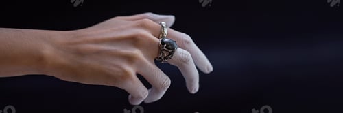Preview: Wearing Elegant Ring on Hand Adorned with Jewelry