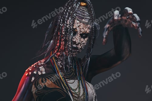 Preview: Scary African shaman with a petrified cracked skin and dreadlocks. Make-up concept.