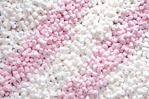Preview: Pink and white mini puffy marshmallows background, closeup texture