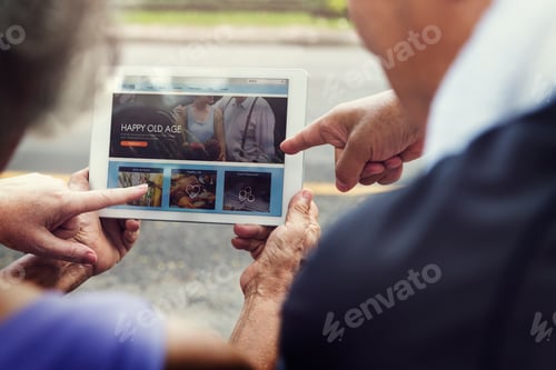 Preview: enior Retirement Exercising Using Tablet Concept