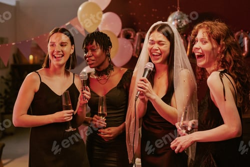 Preview: Group of Young Adult Multiethnic Women Singing Karaoke during Bachelorette Party