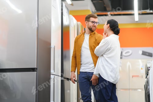 Preview: young couple choose new refrigerator