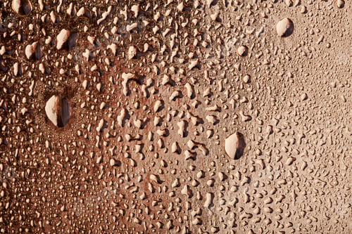 Preview: Colored Water Droplets On A Gold Background. Abstract Liquid Sprays