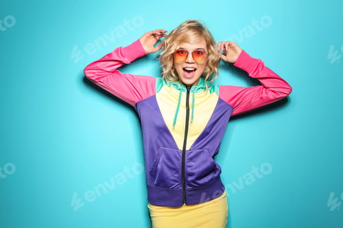 Preview: Emotional stylish young woman on color background
