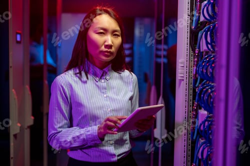 Preview: Asian network engineer doing troubleshooting