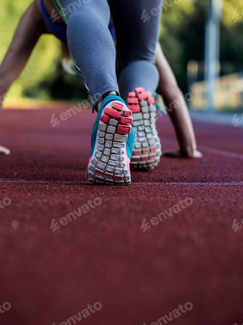 Preview: sports girl on the treadmill ready to run, close-up