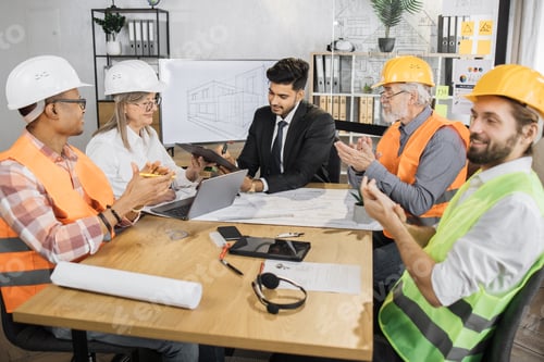 Preview: Indian businessman signs contract and documents of senior woman boss of a construction company.