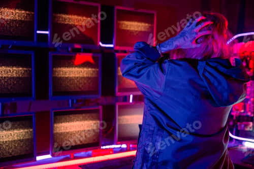 Preview: Woman hacker failing. Angry Asian woman wearing a black jacket hacking programming system access