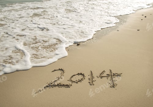 Preview: Year 2014 Hand Written On The White Sand In Front Of The Sea