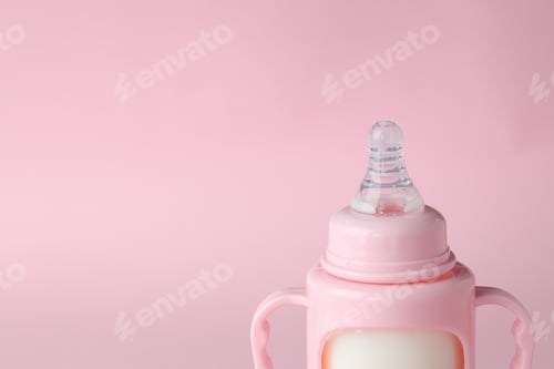Preview: Concept of baby food with рowdered milk on pink background