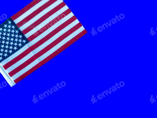 Preview: American Flag Against a Bright Blue Background