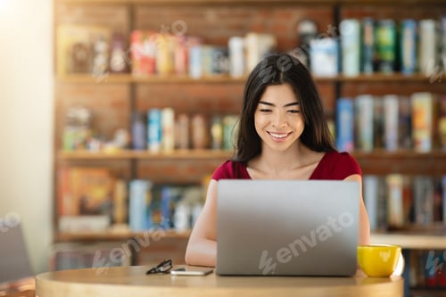 Preview: Working Online Concept. Smiling Asian Girl Freelancer Using Laptop In Cafe