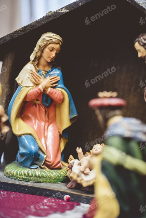 Preview: Vertical shot of mother Mary at born of Christ figurine