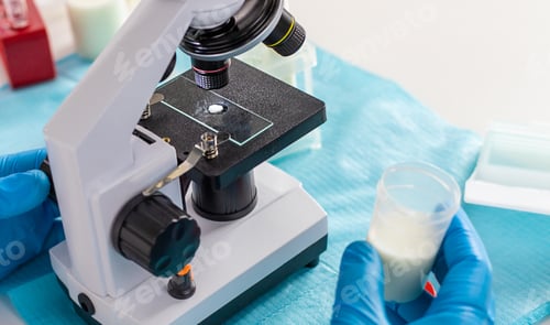 Preview: Examine milk in the laboratory. Selective focus.