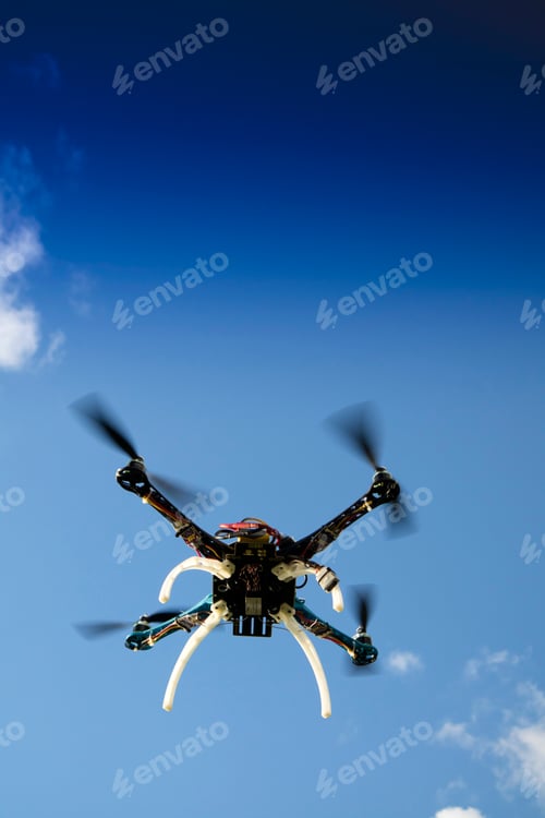 Preview: Drone in flight with cloudy sky