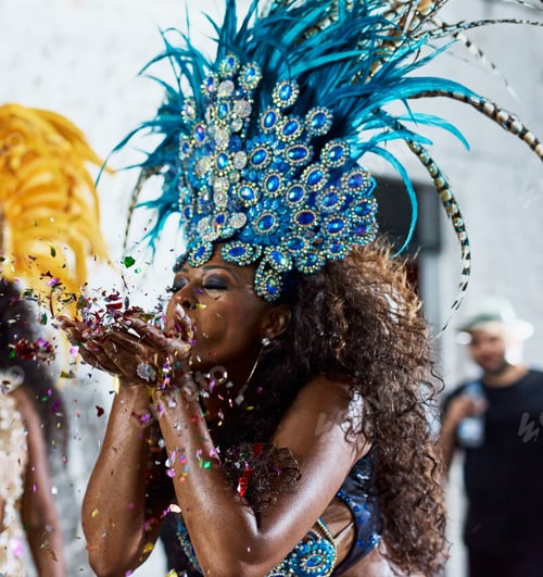 Preview: Cropped shot of a beautiful samba dancer performing in a carnival with her band