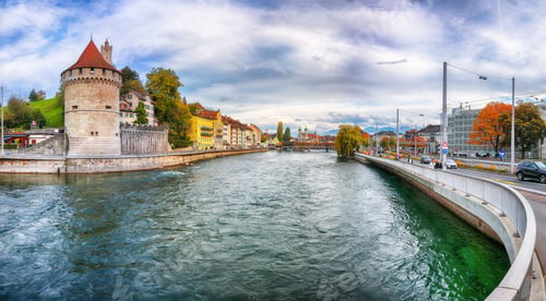 Preview: Fabulous historic city center of Lucerne with famous buildings and calm waters of Reuss river.