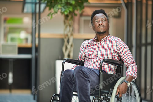 Preview: Office worker sitting in wheelchair