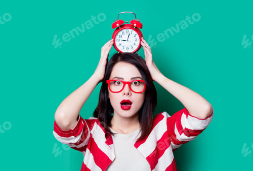 Preview: Woman with alarm clock