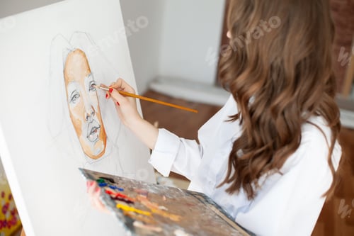 Preview: Young girl painter at artwork process