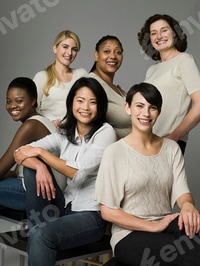Preview: Group of Smiling Women Posing Together Indoors