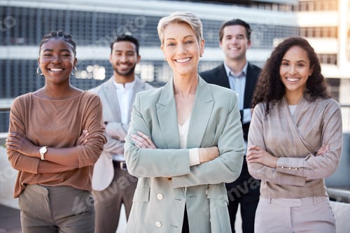 Preview: Shot of a diverse group of businesspeople standing together in the city with their arms folded