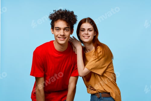 Preview: young couple multicolored t-shirts modern style fashion