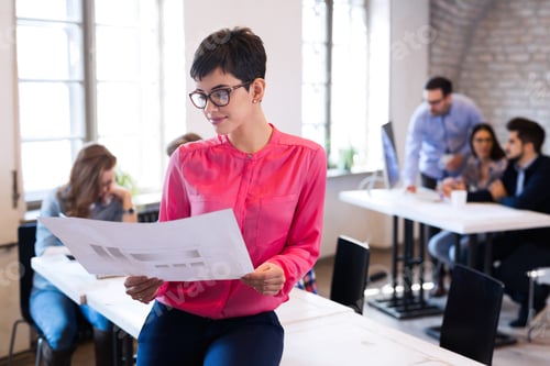 Preview: Business coworkers discussing new ideas and brainstorming in office