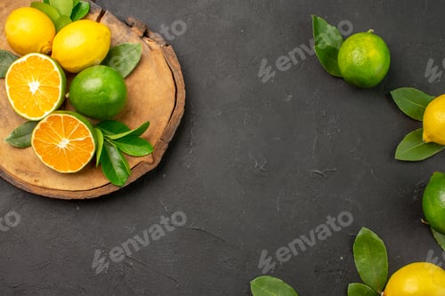 Preview: top view fresh sour lemons on dark-grey background tree fruit citrus lime