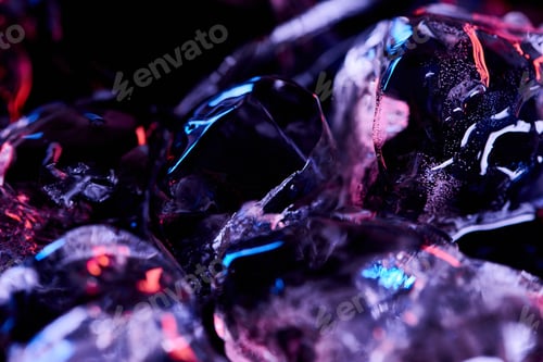 Preview: close up view of ice cubes with purple illumination isolated on black