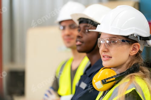 Preview: Robotics engineer working on maintenance of modern robotic arm in factory warehouse
