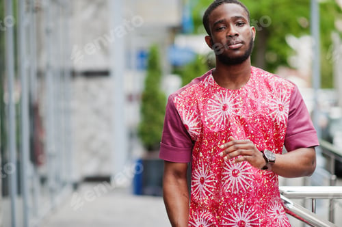 Preview: Black young man wearing african traditional clothes