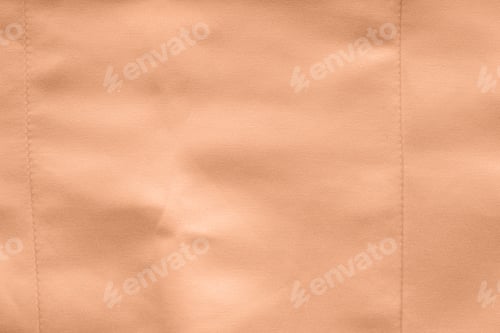 Preview: Peach fuzz satin fabric. Bridal wedding dress textile background