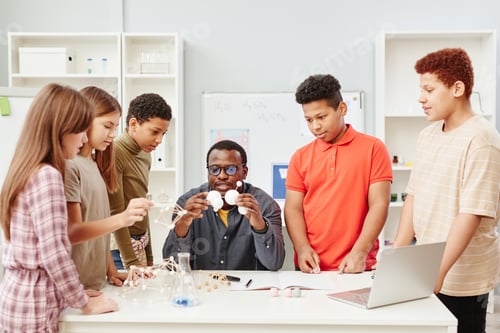 Preview: Diverse Group of Kids with Teacher in Chemistry Class
