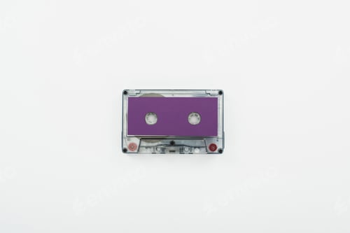 Preview: top view of purple cassette isolated on white
