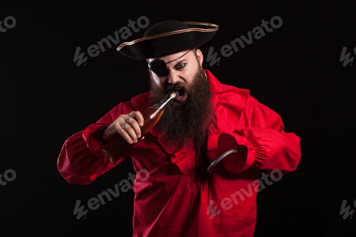 Preview: Portrait of attractive bearded man dressed like a pirate for halloween