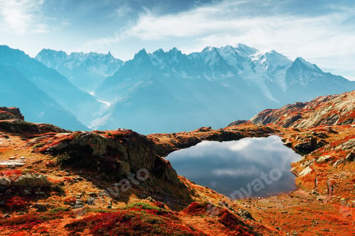 Preview: Colourful sunset on Chesery lake in France Alps