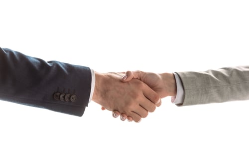 Preview: partial view of man and woman shaking hands isolated on white