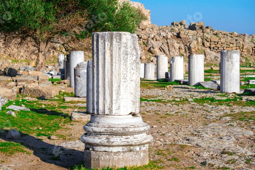 Preview: Ruins of columns in ancient city of Pergamon in sunny day. Bergama, Turkey.