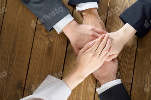 Preview: Business person clasping his hands together