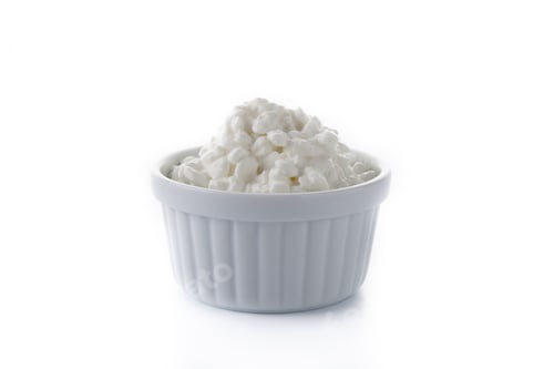 Preview: Bowl of Fresh Cottage Cheese on White Background
