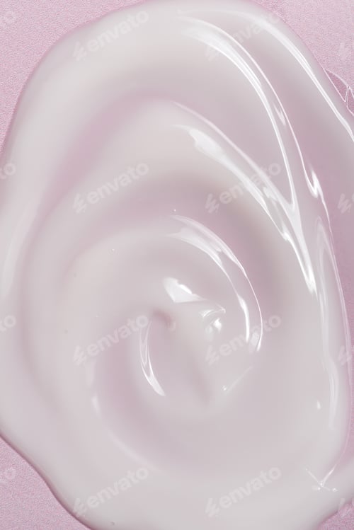 Preview: A vertical shot of a wet pink surface lotion
