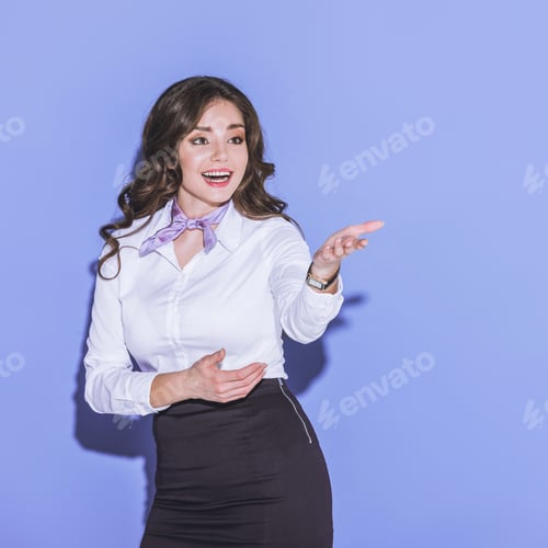 Preview: attractive stewardess showing at something on purple