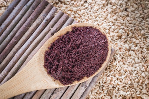 Preview: Acai powder in bowl on wooden background