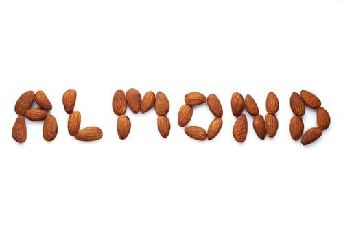 Preview: Lmonds arranged to spell 'ALMOND' on a white background.