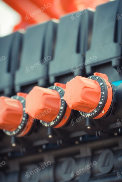 Preview: Operating control buttons or knobs in industrial machine. Technology concept