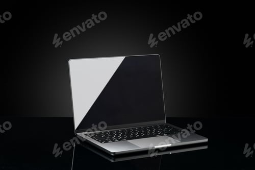 Preview: Open laptop with black screen against black background